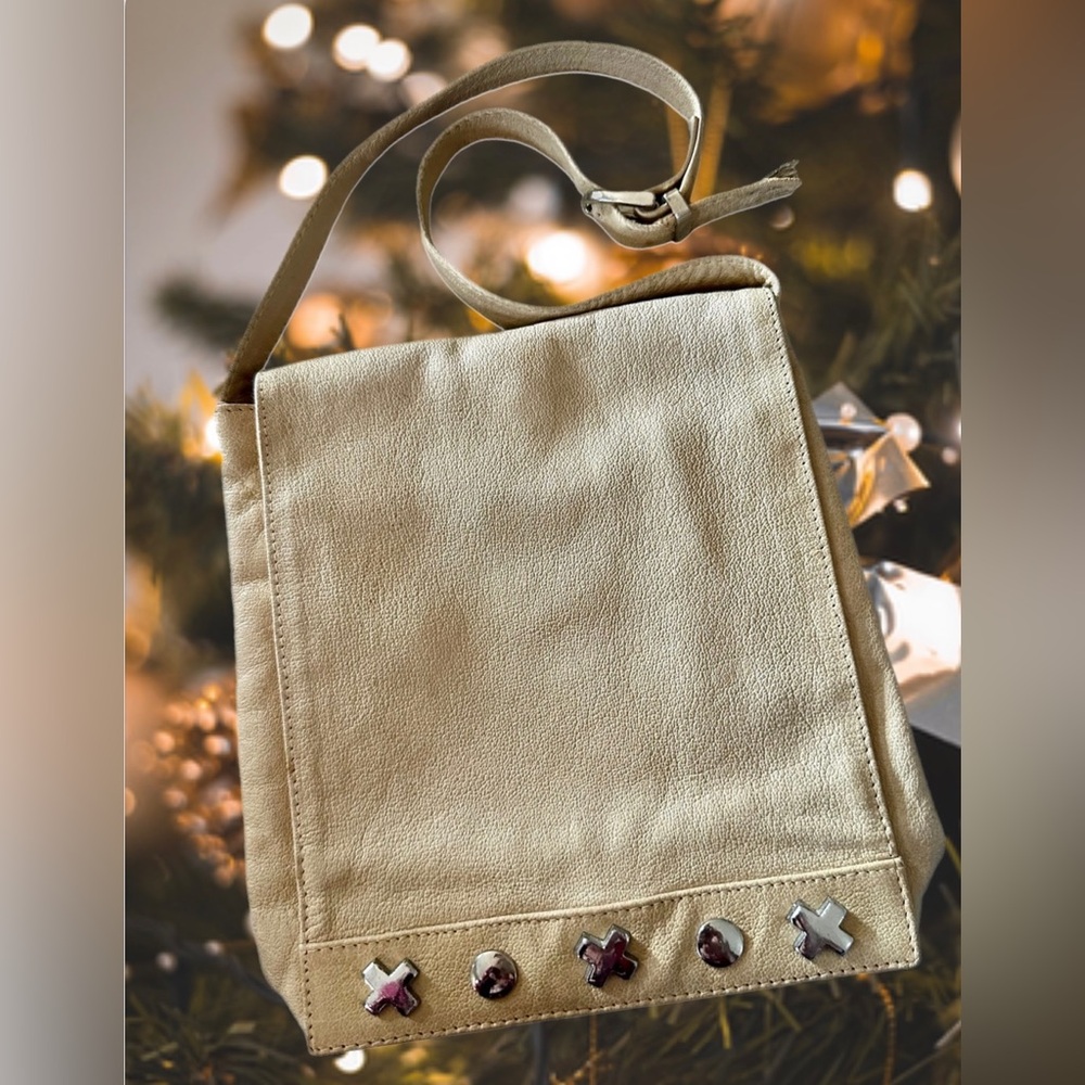 UNLISTED brand Tan Leather with Silver XO Embellishments